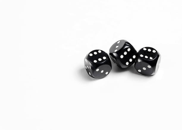 istock Dice on a white background. Three black dice. Gambling. 1198233534