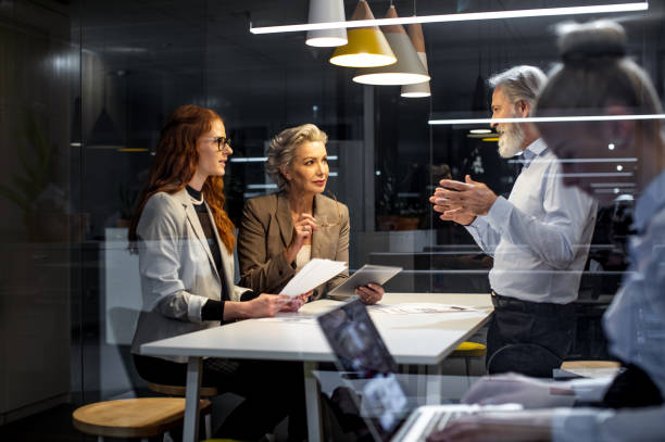 istock Business people working late in the office 1198234923