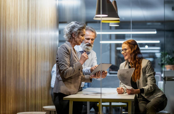 istock Business people working late in the office 1198235230