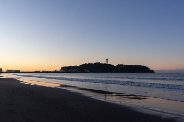 Enoshima is a typical tourist destination of Shonan.  I took a sunrise around this place. Enoshima is a typical tourist destination of Shonan.  I took a sunrise around this place. shonan photos stock pictures, royalty-free photos & images