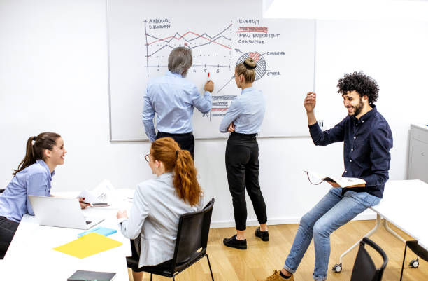 istock Business people at a board meeting 1198236163