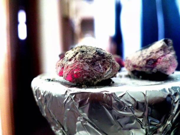 istock Two pieces of coal enough to fire the hookah 1198236494