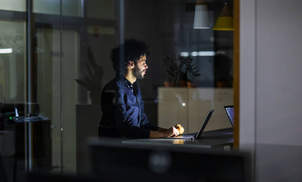 istock Businessman working late in the office 1198236555
