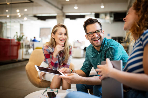 Business people brainstorming and chatting at workplace office