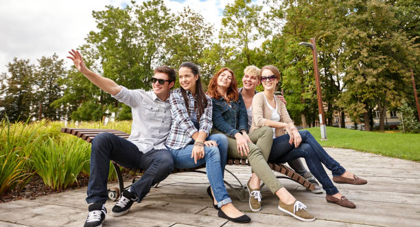 istock group of students or teenagers hanging out 1198238954