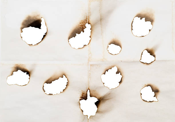 istock holes in a paper 119824049