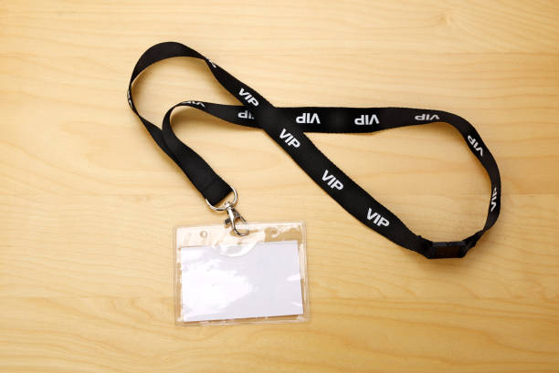 istock White empty ID card isolated on wooden background. 1198241676
