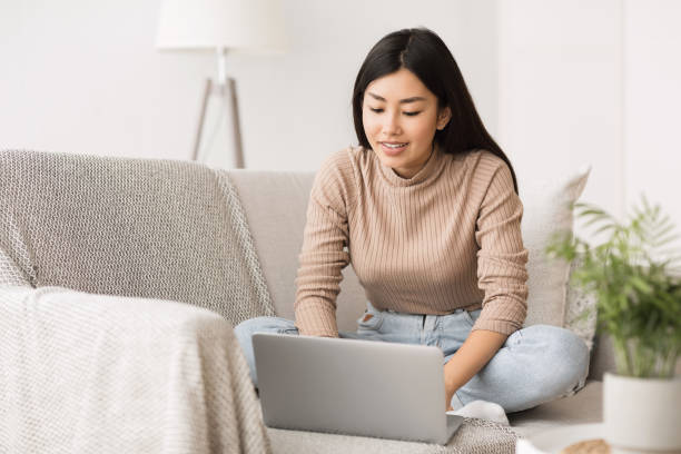 istock Recruitment concept. Girl browsing work opportunities online 1198243128