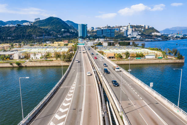 mehrspurige autobahn in ma on shan, hongkong - driving industry land vehicle multiple lane highway stock-fotos und bilder