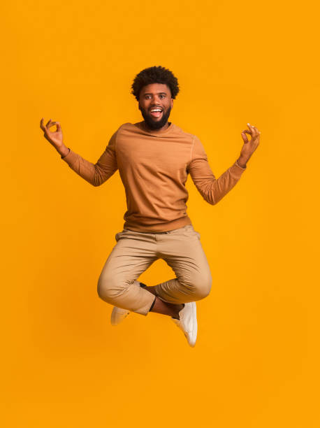 istock Peaceful black yogi guy meditating in the air 1198244944