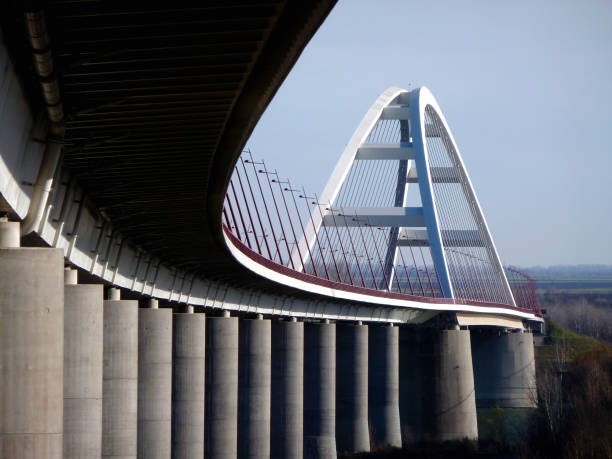 istock basket handle arch steel suspension bridge and concrete support 1198249713