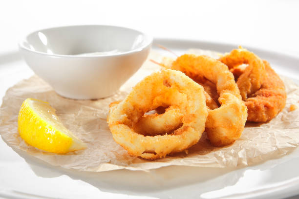 istock Breaded Fried Squid Rings and Shrimp with Tartar Sauce 1198251044