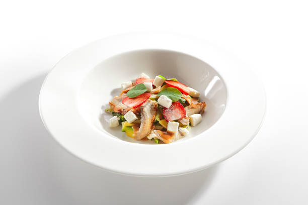 istock Salad with Smoked Eel Fish or Unagi, Avocado and Strawberries 1198251075