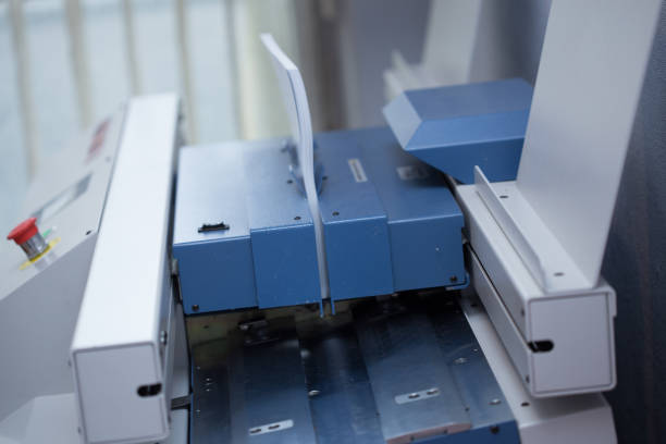 istock Production and gluing of books. 1198253801