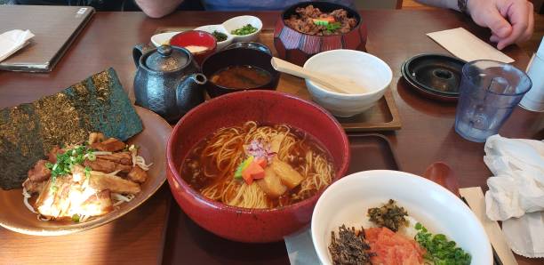 istock Japanese lunch at restaurant with noodles, tea, rice 1198254871