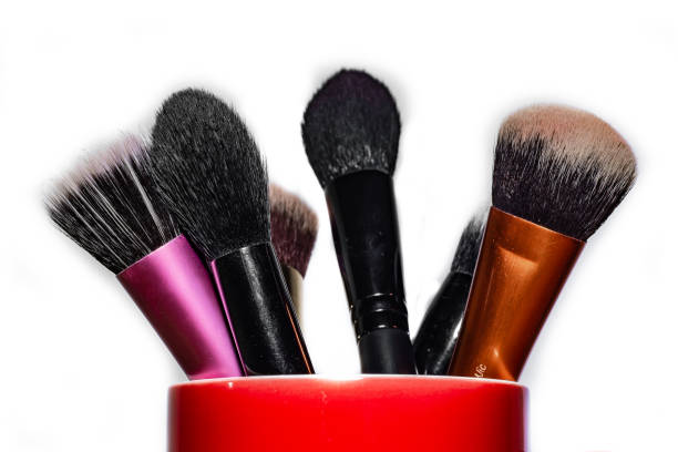Use professional tools make your face look pretty. Let's have a cup full of make-up brushes