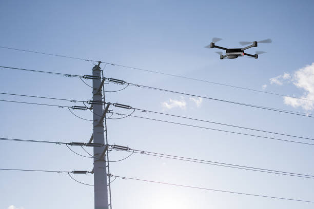 istock drone inspecting electricity power lines 1198258925