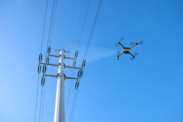 istock drone inspecting electricity power lines 1198258935