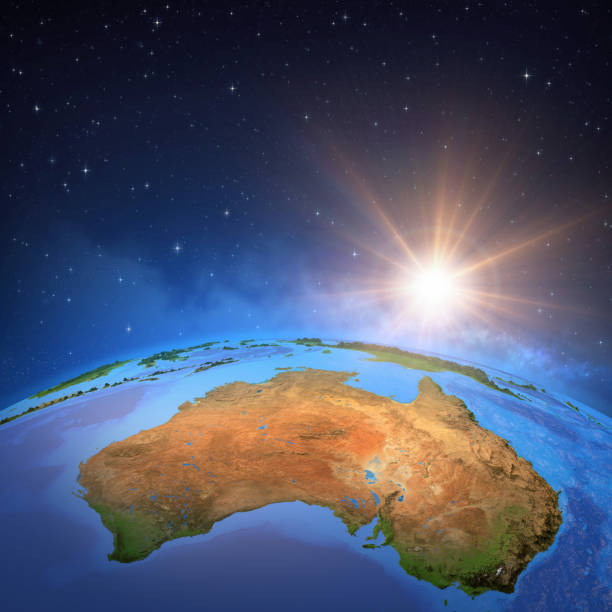 sun shining over australia from space - three dimensional shape continents bright blue imagens e fotografias de stock