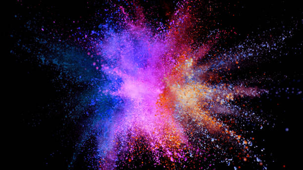 istock Explosion of colored powder isolated on black background 1198260531