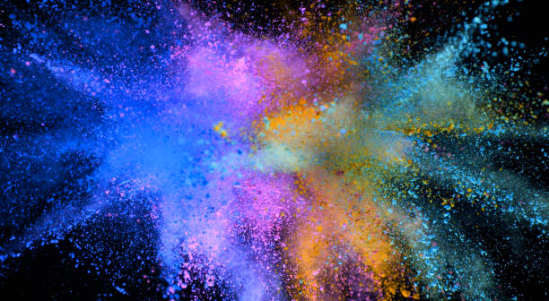 istock Explosion of colored powder isolated on black background 1198260558