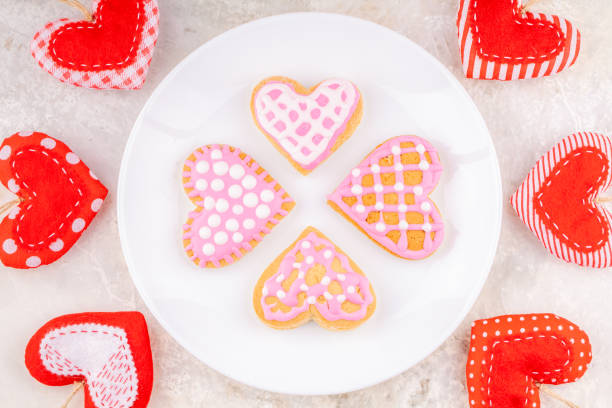 istock White Plate with Handmade Glazed Cookies on White Marble Background 1198262805
