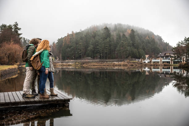 istock Friends traveling in mountain, amazed looking at view 1198263282