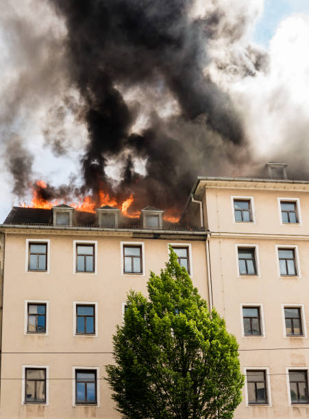 istock Fire in a house on the roof 1198264017