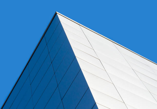 istock fragment corner of a modern building on a blue background 1198265459