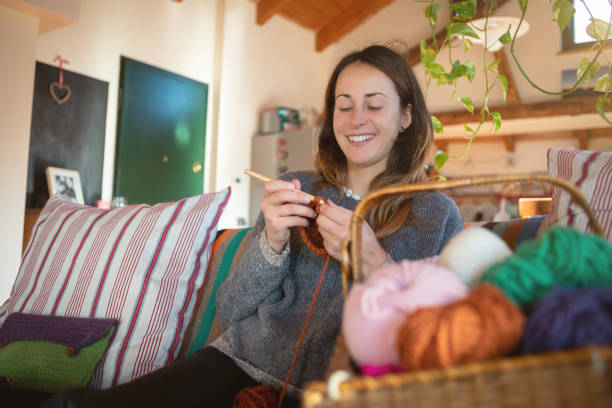 istock Young knitter woman relaxing and working at home 1198267787