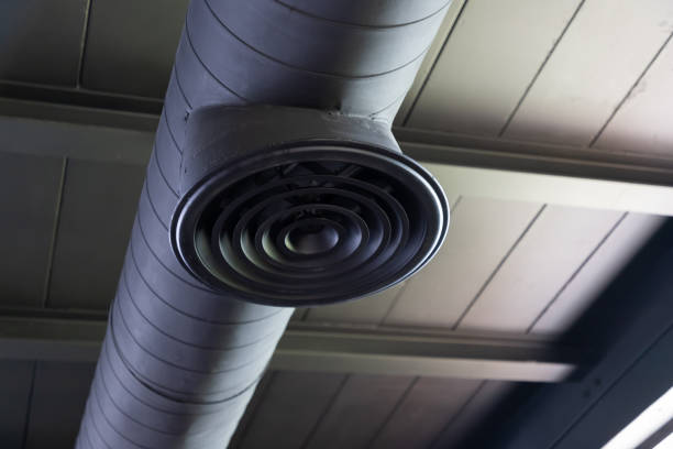 istock Building interior air duct and pipe. air condition system on bare skin ceiling. 1198268899