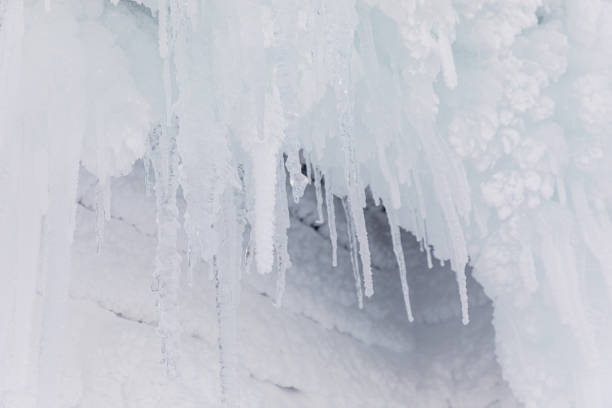 istock ice icicles on the eave of a roof 1198274175