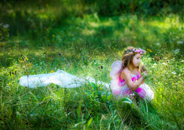 istock Little Girl in a Meadow 1198275494