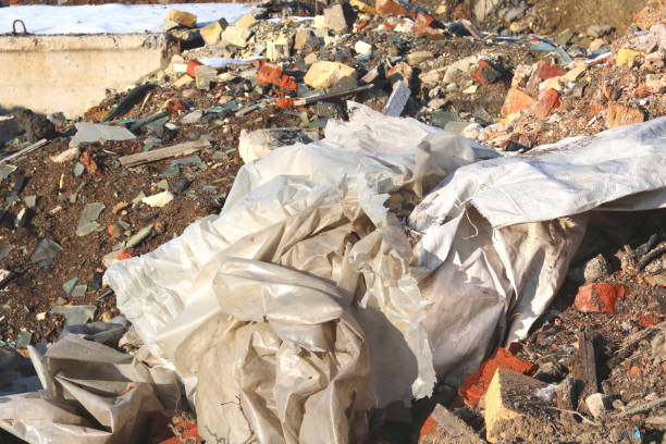istock Construction waste with elements of various dismantled and destroyed old structures at landfill 1198276462