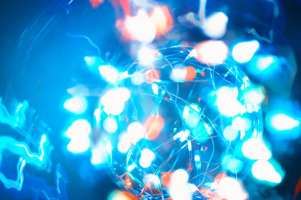 istock Magic light highlights, Christmas lights, blurred spots and lines of light 1198280113