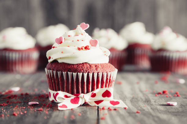 istock Valentines red velvet cupcakes on a rustic wooden table 1198280361