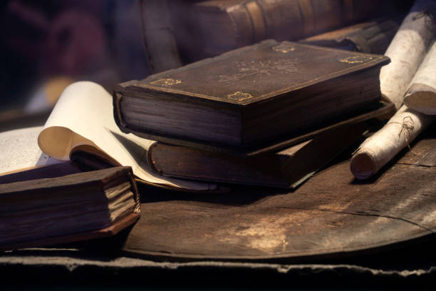istock Old book and parchment detail 1198281220