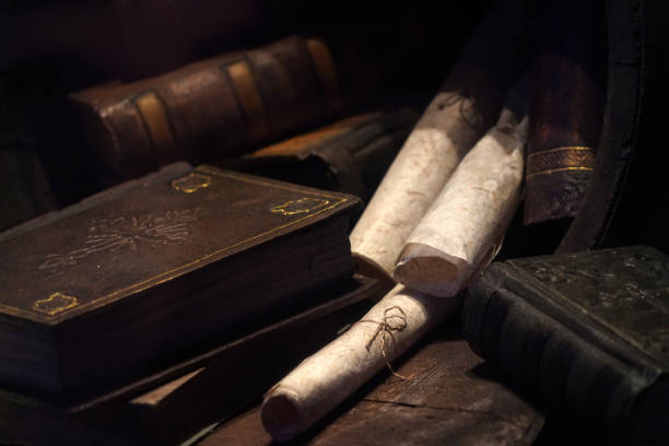 istock Old book and parchment detail 1198281248