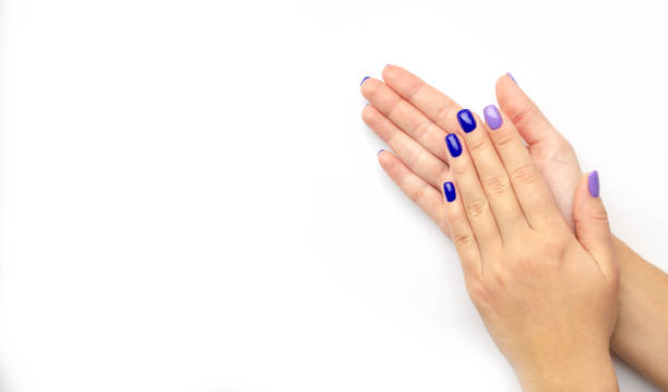 istock Stylish trendy women's manicure. Blue and lilac 1198290935