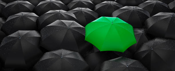 istock Crowd of Umbrellas with Leader 1198291670