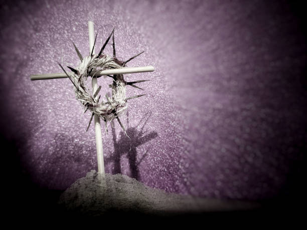 Antique stone statue Jesus Christ in a crown of thorns as symbol of love, faith and religion.
