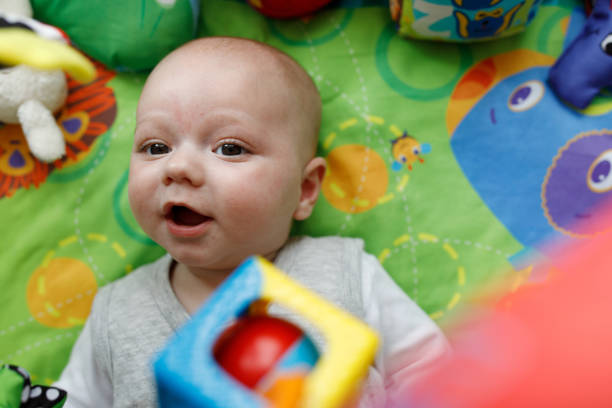 istock Baby smiling on playground 1198292955