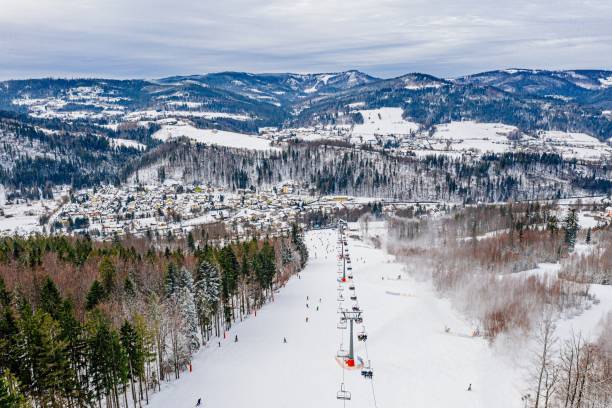 istock Drone view on ski slope in Polish Beskid mountains 1198295973