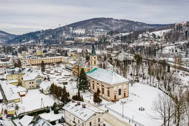 Photo of Aerial drone view on Wisla town at winter. Wisla, Silesian Beskid