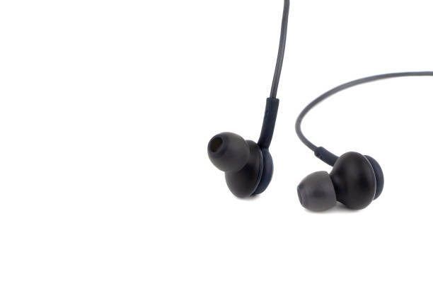 istock Black earphones. Isolated on white background. 1198297321