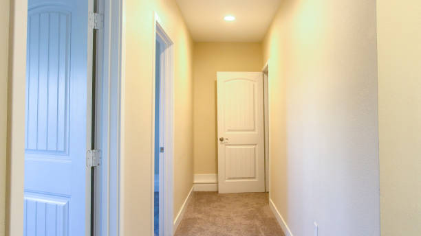 istock Panorama Carppet in a halway of an empty home 1198299646