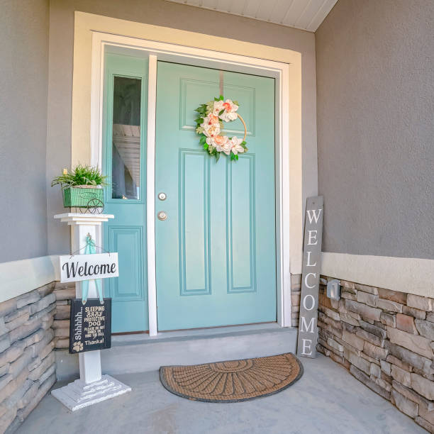 istock Square frame Green painted front door to a suburban house 1198300980