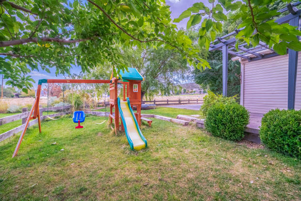 istock Small kids playground in a private garden 1198301973