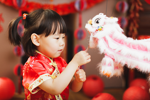 Chinese baby girl with traditional dressing up celebrate Chinese new year
