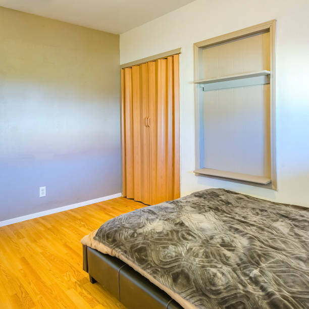 istock Square frame Lit bedroom of California home 1198305213
